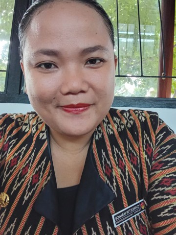 Chrestin Manice, S.Pd, Gr